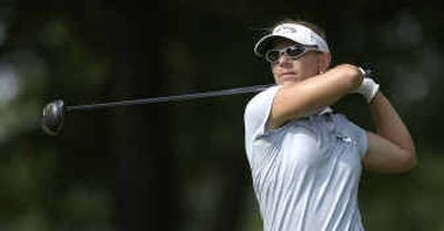 Annika Sorenstam drives at the 11th hole. She is two strokes off the lead.
(Associated Press / The Spokesman-Review)
