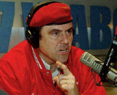 
Guardian Angels founder and radio personality Curtis Sliwa talks at the microphone Thursday in the WABC radio studios in New York. 
 (Associated Press / The Spokesman-Review)