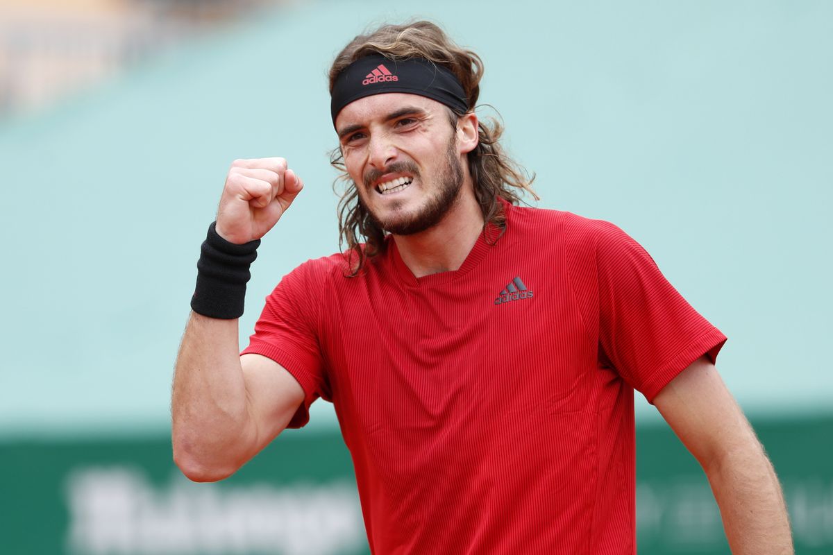 Stefanos Tsitsipas of Greece celebrates after defeating Daniel Evans of Britain in their semifinal match of the Monte Carlo Tennis Masters tournament in Monaco, Saturday, April 17, 2021.  (Associated Press)