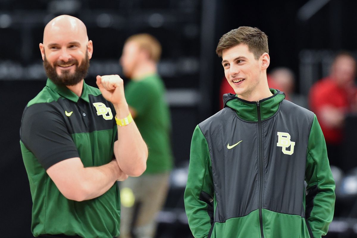 Former Zags John Jakus and Rem Bakamus who are both now assistants at Baylor laugh during a practice leading up to the first round of the NCAA basketball tournament on Wednesday, March 20, 2019, at Vivint Smart Home Arena in Salt Lake City, Utah.  (Tyler Tjomsland / The Spokesman-Review)