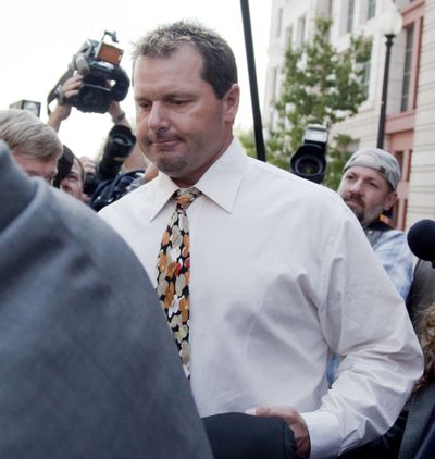 Roger Clemens leaves federal court after pleading not guilty. (Associated Press)