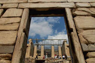 
The Propylea, the entrance to the sacred hill of the Acropolis, is seen through the gate of Beule, in Athens.
 (Associated Press / The Spokesman-Review)