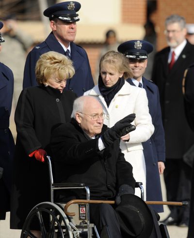 ORG XMIT: MDNW106 Former Vice President Dick Cheney, in wheelchair, waves on the tarmac, Tuesday, Jan. 20, 2009 at Andrews Air Force Base, Md.(AP Photo/Nick Wass) (Nick Wass / The Spokesman-Review)