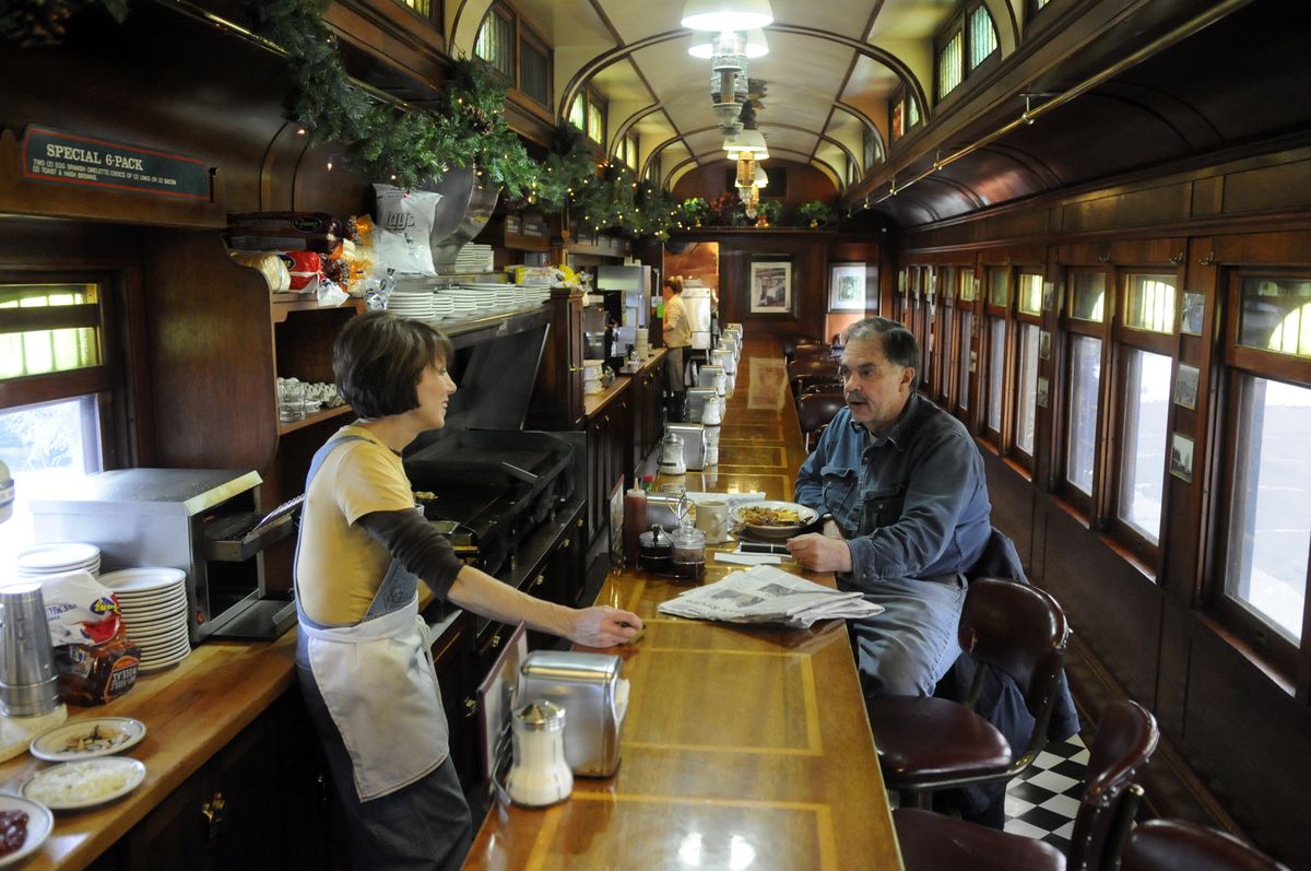 Vicki Green chats with regular customer George Bick during a late lunch Tuesday at Knight’s Diner in Spokane. Green and her husband bought the diner-in-a-rail-car in 1981 and have run it since. (Photos by Dan Pelle / The Spokesman-Review)