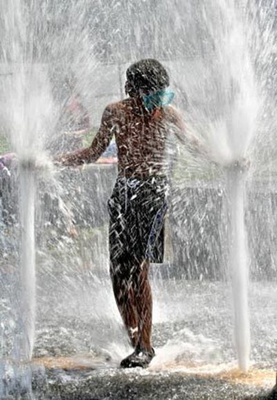 Seattle Times
Standout summer to bring more heat
Isaac Poole, 11, keeps it cool in the fountain at Miller Community Center on Seattle's Capitol Hill on Tuesday, when the high temperature was 87 degrees. More hot weather is expected.
(The Spokesman-Review)