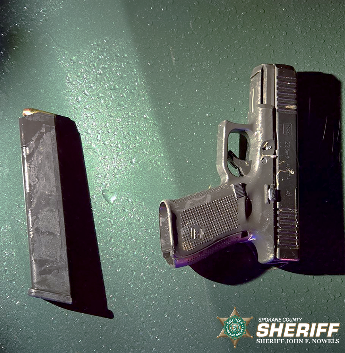 A 13-year-old boy threw a Glock 23 into foliage before being arrested under suspicion of kidnapping, assault and unlawful possession of a firearm. (Photo courtesy of Spokane County Sheriff