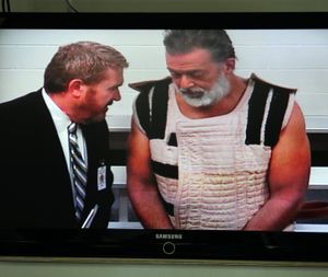 Colorado Springs shooting suspect, Robert Dear, right, appears via video before Judge Gilbert Martinez, with public defender Dan King, at the El Paso County Criminal Justice Center for this first court appearance, where he was told he faces first degree murder charges today in Colorado Springs, Colo. (Daniel Owen/The Gazette via AP, Pool)