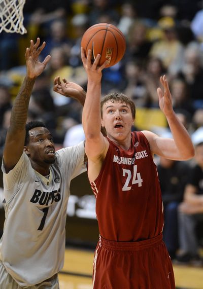 Washington State's Josh Hawkinson, the Pac-12’s most improved player last season, will help the Cougars open the season on Friday with a slew of new faces. (Associated Press / Associated Press)