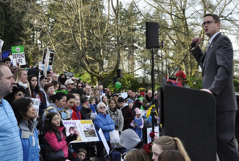 OLYMPIA -- Rep. Matt Shea, R-Spokane Valley, tells members of the March for Life on the steps of the state Capitol to continue the fight against legalized abortion. (Jim Camden)