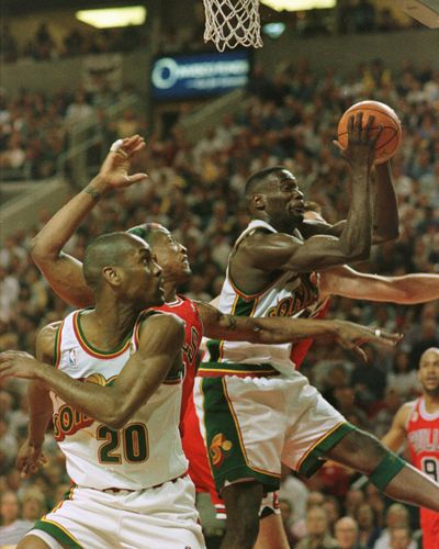 Shawn Kemp and Gary Payton (20) battle Dennis Rodman and the Chicago Bulls during the Seattle SuperSonics' June 12, 1996 appearance in the NBA Finals. The Bulls won the series 4-2.  (Getty Images)