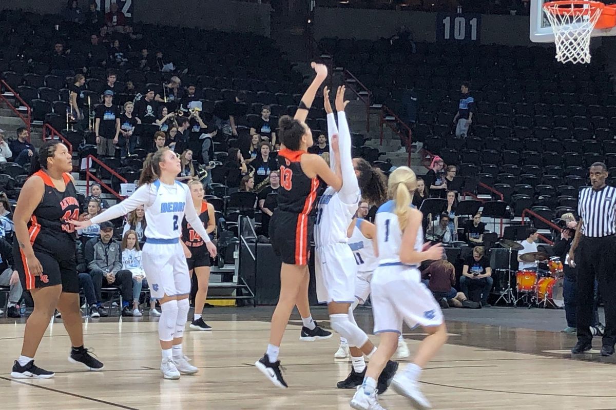 Lewis and Clark’s Jacinta Buckley scores two of her 17 points against Central Valley in the District 8 4A title game at the Spokane Arena on Feb. 16, 2019. (Dave Nichols / The Spokesman-Review)