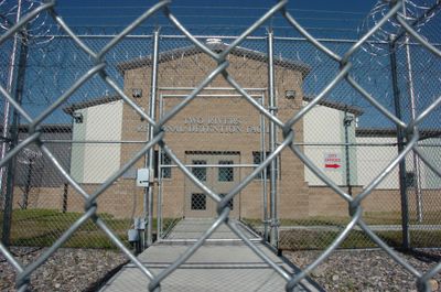 The entrance to the Two Rivers Detention Center in Hardin, Mont., has sat empty during the two years since it was built. (Associated Press / The Spokesman-Review)