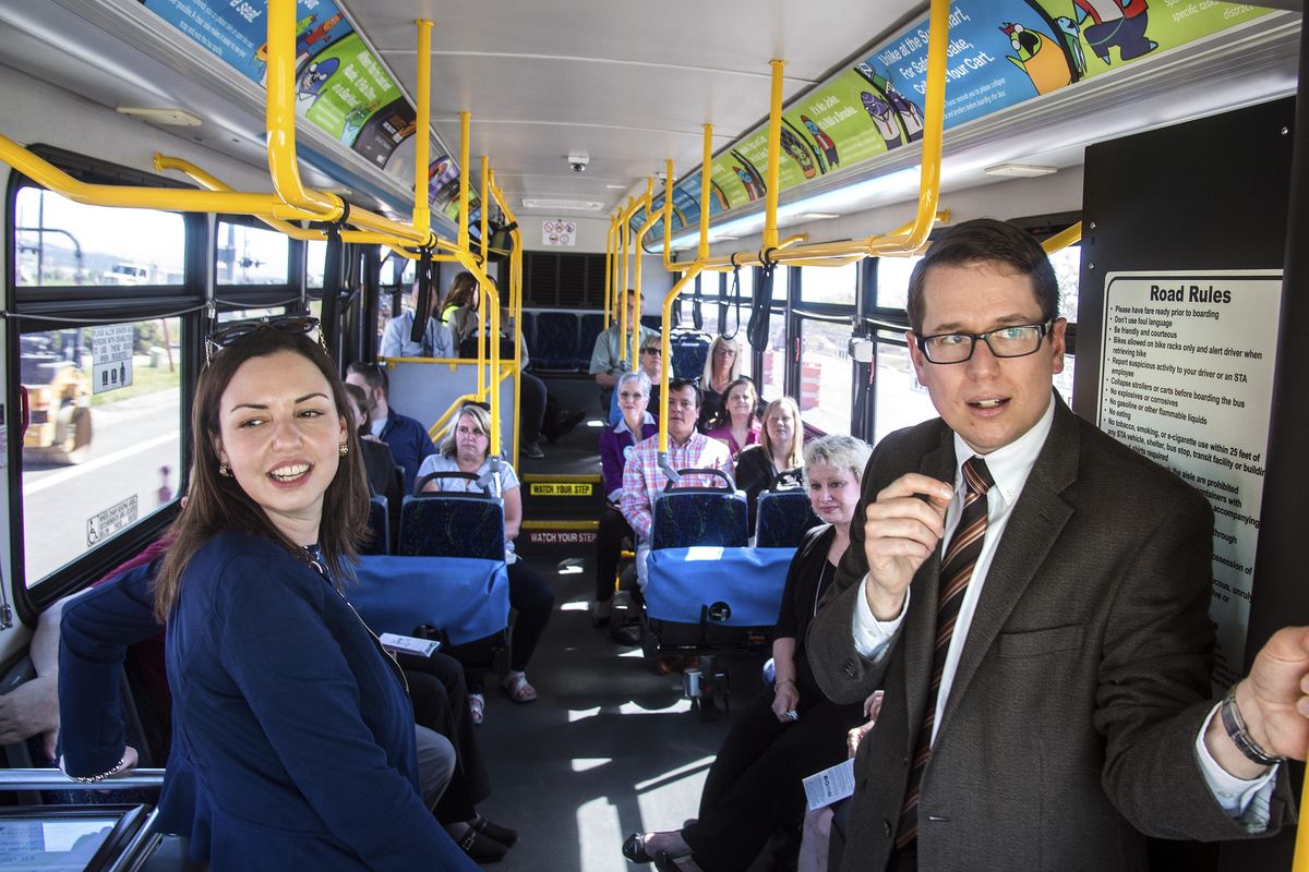 Katherine Morgan, president and CEO of the Spokane Valley Chamber, left, and Karl Otterstrom, director of planning and development at STA, serve as hosts for a bus tour for the new STA valley 95 route Monday. (Dan Pelle / The Spokesman-Review)