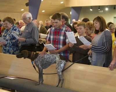 Spotted in church on Sunday: Bryan, Peyton and Karen Krych and their dog Elsa attend St. Mark’s Lutheran Church Blessing of the Animals service in Spokane on Sunday. The service celebrates the feast day of Francis of Assisi, a nature lover and patron saint of animals and the environment. Each year, St. Mark’s invites the parish and community to bring their pets to be blessed. See more photos from the service at www.spokesman.com/picture-stories. (Colin Mulvany)