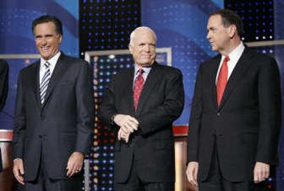
Republican presidential hopefuls Mitt Romney, John McCain and Mike Huckabee gather last weekend in New Hampshire. An election year is sure to increase chatter in offices, but business owners and managers are advised to avoid taking draconian measures.Associated Press
 (Associated Press / The Spokesman-Review)