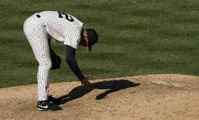 Mariano Rivera reacts to Jason Varitek's game-tying homer for Boston on Tuesday.
(Associated Press / The Spokesman-Review)