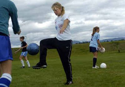 
Senior forward Sara Wilson practices with the Central Valley High School girls soccer team in an afternoon practice earlier this month.
 (Holly Pickett / The Spokesman-Review)