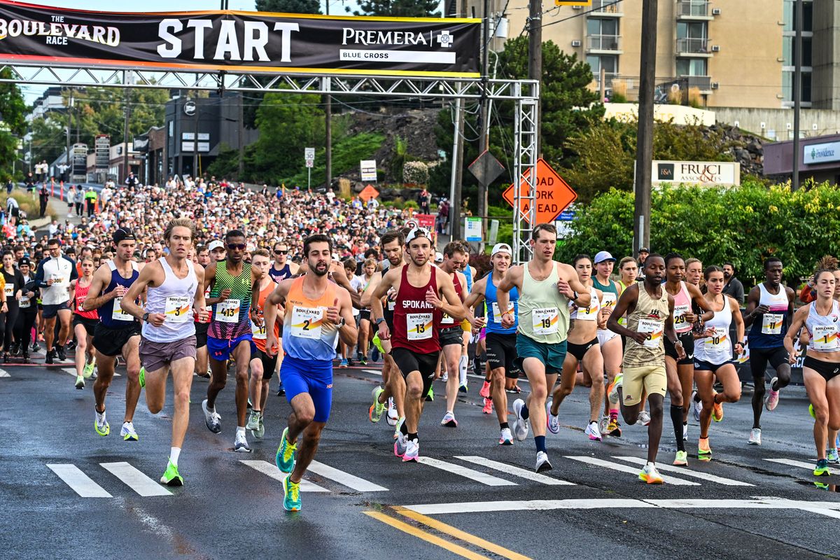 Elite runners break from the line and head south on Washington Street at the start of the Boulevard Race, Sunday, Sept. 24, 2023, in Spokane. Women