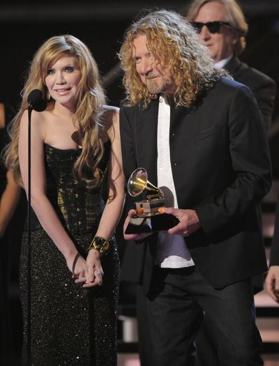 Alison Krauss and Robert Plant accept for album of the year.   (Associated Press / The Spokesman-Review)