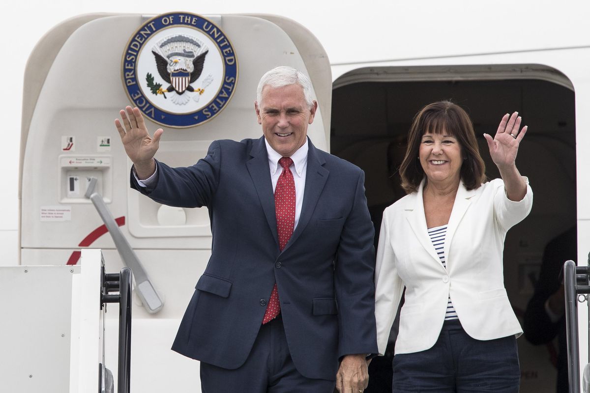 U.S. Vice President Mike Pence and his wife Karen Pence wave as they arrive at the airport in Tallinn, Estonia, Sunday, July 30, 2017. Pence arrived in Tallinn for a two day visit where he will meet Baltic States leaders to discuss regional security issues as well as economic and political topics. (Mindaugas Kulbis / Associated Press)