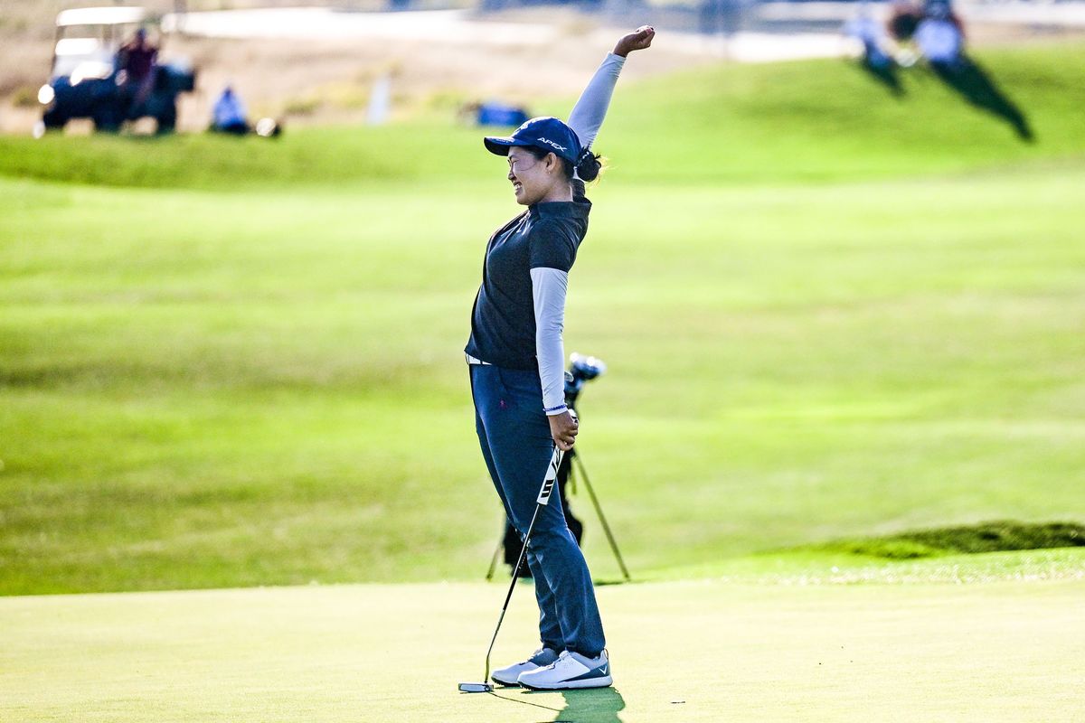 Yue Ren reacts after defeating Chanettee Wannasaen after two playoff holes to win the Epson Tour’s Circling Raven Championship on Sunday at Circling Raven Golf Course in Worley, Idaho.  (Kathy Plonka/The Spokesman-Review)