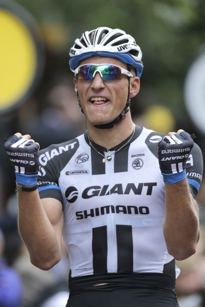 German sprinter Marcel Kittel celebrates after winning the Tour de France’s third stage as the event arrived in London. (Associated Press)