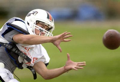 
West Valley's Camron Bowman snags a pass during practice. After four years playing in the Greater Spokane League, the Eagles join the Great Northern League this year.
 (Joe Barrentine / The Spokesman-Review)