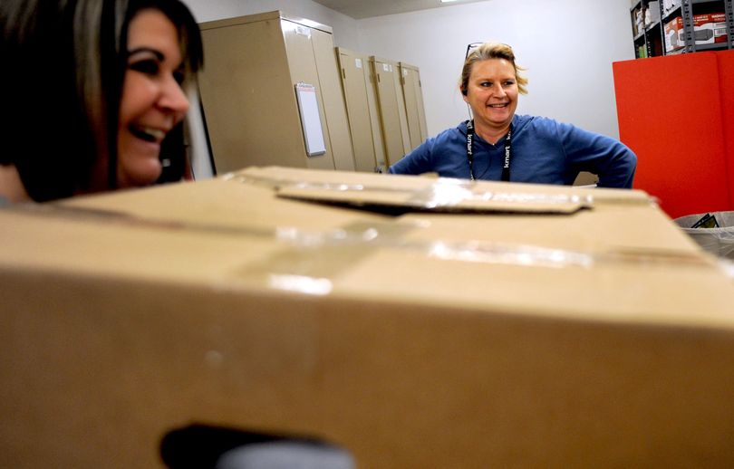 “We’ve got a whole stack of layaway angels,” said Gail Wyronski, right, at Kmart in Coeur d’Alene on Tuesday. (Kathy Plonka)