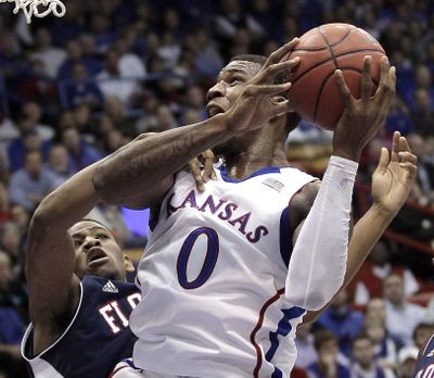 Forward Thomas Robinson had 19 points and 17 rebounds for No. 15 Kansas. (Associated Press)