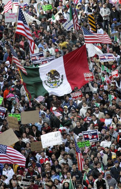
Thousands of Latinos and their supporters march through Milwaukee streets on Thursday, participating in 
