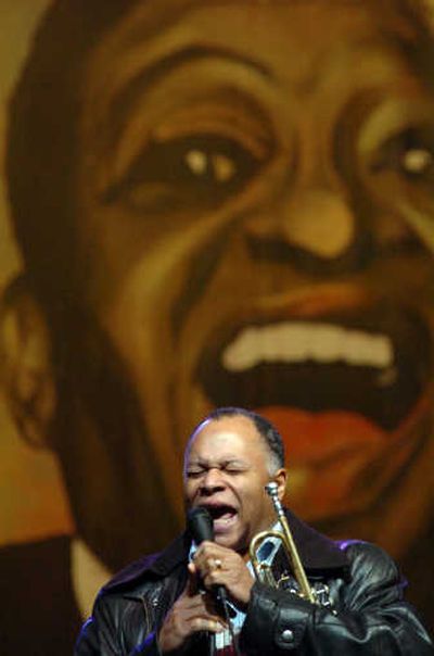 
Standing before a backdrop of Lionel Hampton, Byron Stripling sings during a sound check for February's jazz festival at the University of Idaho. 
 (File / The Spokesman-Review)