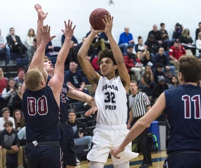 Anton Watson of Gonzaga Prep hits a jump shot against Mt. Spokane on Dec. 5, 2017. (Dan Pelle / The Spokesman-Review)