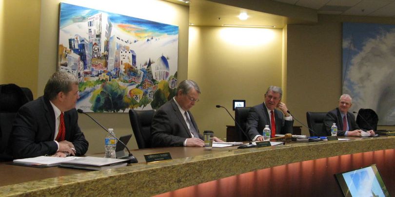 Idaho's state Board of Examiners meets Tuesday morning; from left are Attorney General Lawrence Wasden, Secretary of State Lawerence Denney, and Gov. Butch Otter; at right is state Controller Brandon Woolf, who serves as secretary to the board. (Betsy Z. Russell)