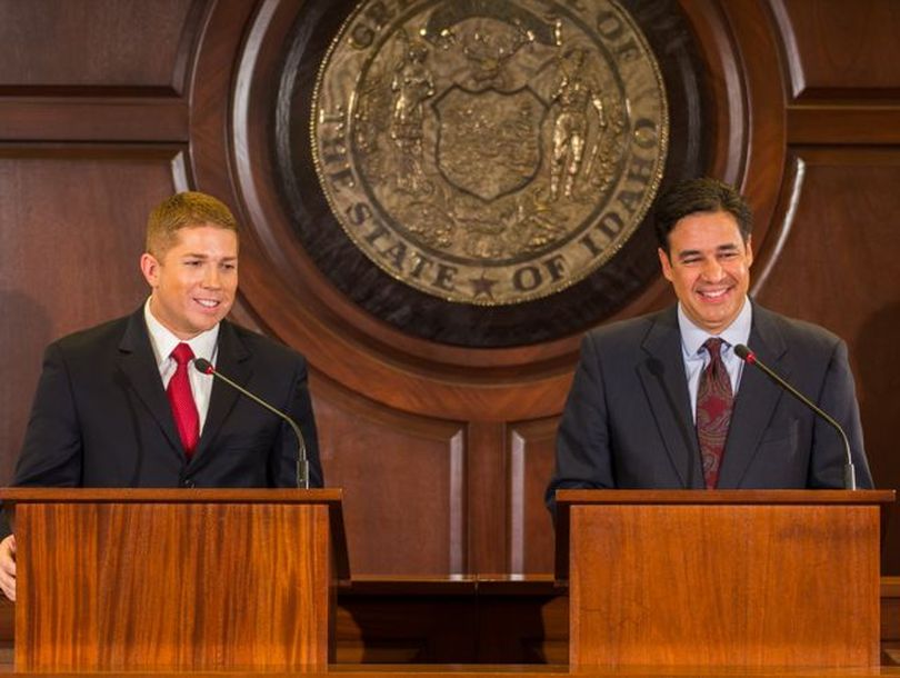 Democratic challenger Jimmy Farris, left, and GOP Rep. Raul Labrador, right, smile during a debate on live TV on Thursday night. (Idaho Public TV / Kevin Rank)