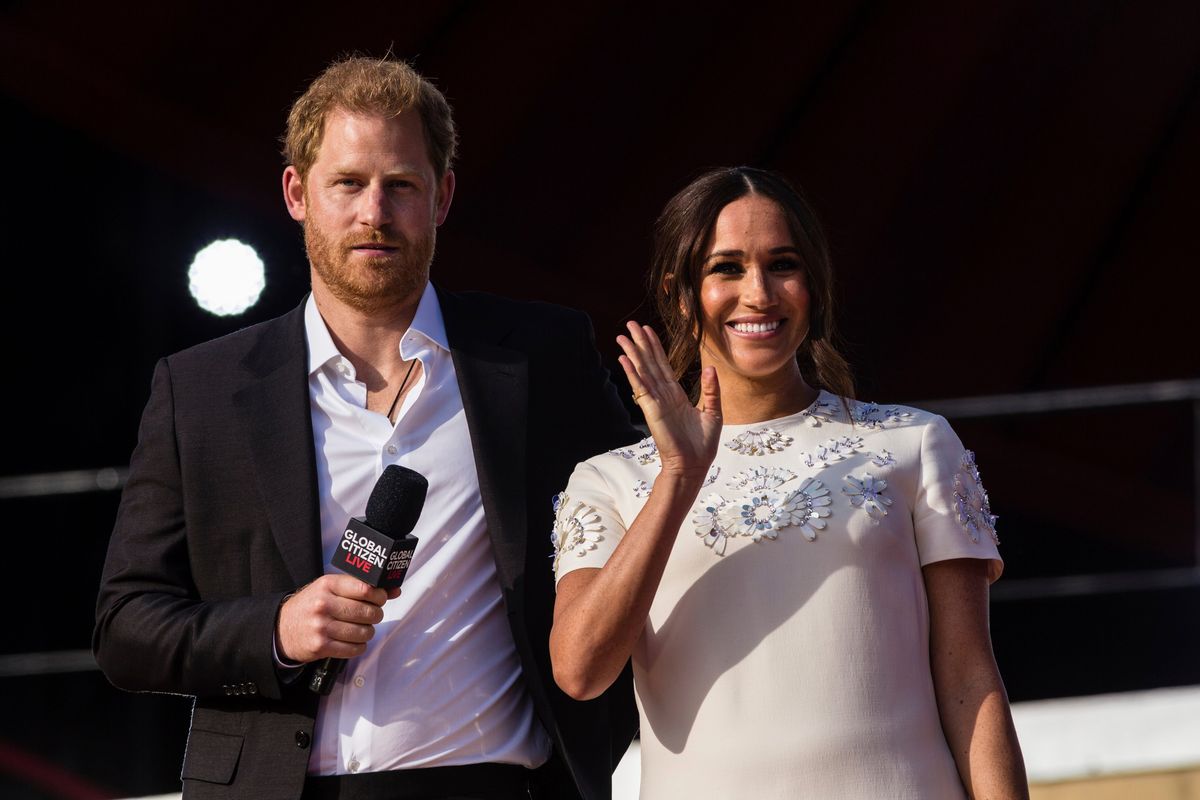 FILE - Prince Harry and his wife Meghan speak during the Global Citizen festival, on Sept. 25, 2021 in New York. Prince Harry and his wife Meghan have visited Queen Elizabeth II at Windsor Castle on their first joint visit to the U.K. since they gave up formal royal roles and moved to the U.S. more than two years ago. The couple’s office says they visited the 95-year-old queen, Harry’s grandmother, Thursday, April 14, 2022 on their way to the Netherlands to attend the Invictus Games  (Stefan Jeremiah)