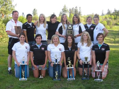 State coach of the year Jeff Orwick, left, standing, poses for a photo with the River City Steelers, back row: Ashley Hickson, Andrea Rees, Kaylyn Plumb, Rachael Killingsworth, Kourtni Pannell, Syndey Bronson and Mallory Flesher. Front row: Jacy Fitzpatrick, Callie Paul, Kaitlyn Proctor, Christi Schofield, Haley Orwick and Lexi Plumb.Courtesy of Downs Paul (Courtesy of Downs Paul / The Spokesman-Review)