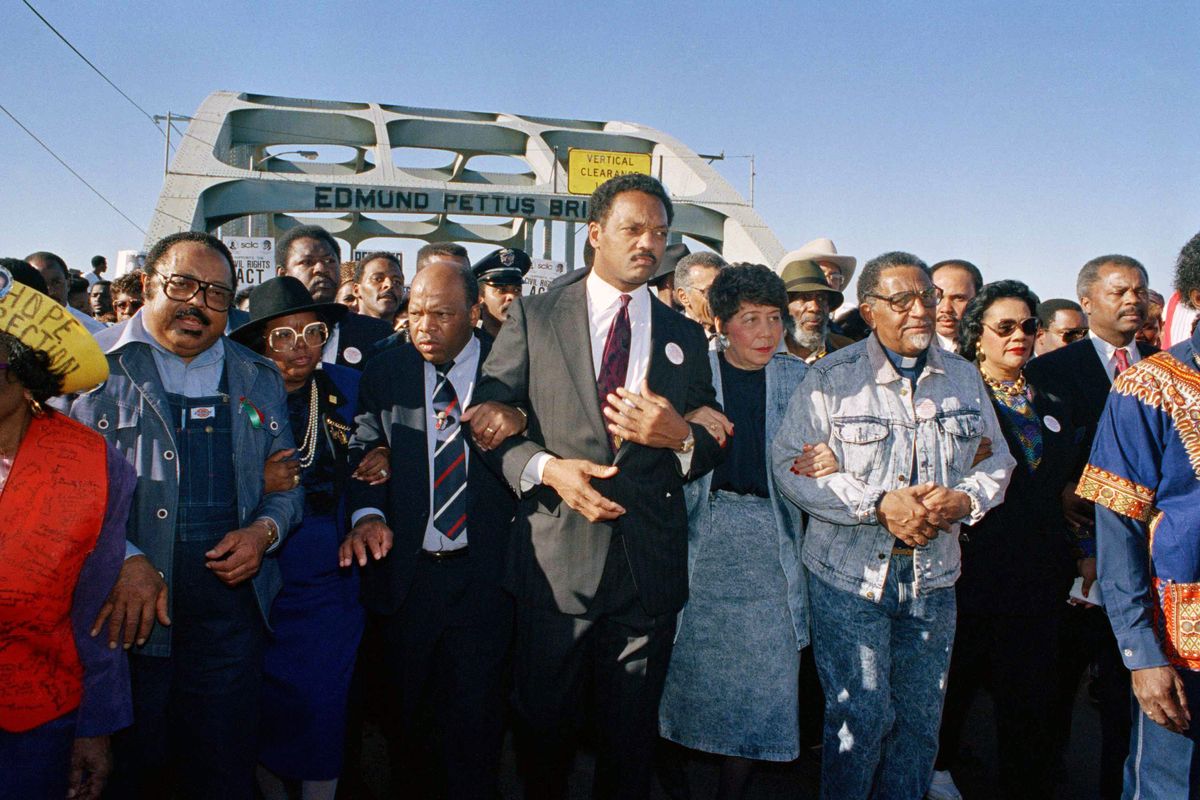 In this March 4, 1990 photo, civil rights figures lead marchers across the Edmund Pettus Bridge during the recreation of the 1965 Selma to Montgomery march in Selma, Ala. From left are Hosea Williams of Atlanta, Georgia Congressman John Lewis, the Rev. Jesse Jackson, Evelyn Lowery, SCLC President Joseph Lowery and Coretta Scott King. This Sunday, March 7, 2021, marks the 56th anniversary of those marches and "Bloody Sunday," when more than 500 demonstrators gathered on March 7, 1965, to demand the right to vote and cross Selma