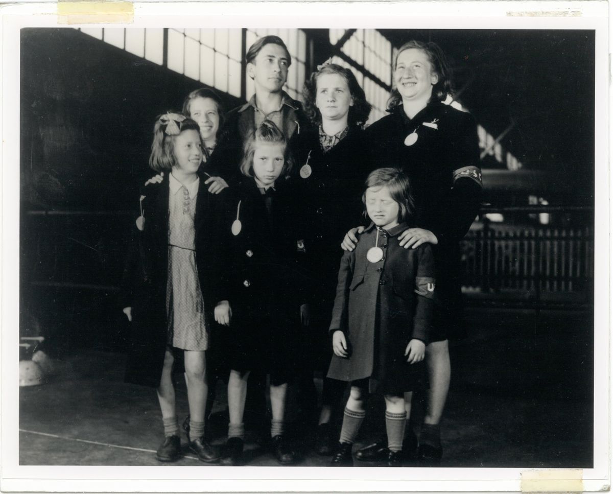 In this May 26, 1946, photo, Ginger Lane, bottom right, and her siblings arrive in New York City as Holocaust survivors who were hidden in a fruit orchard near Berlin by non-Jews. Their mother was killed at the death camp at Auschwitz. Lane has since made it her lifelong mission to educate others of this painful past.  (HONS)