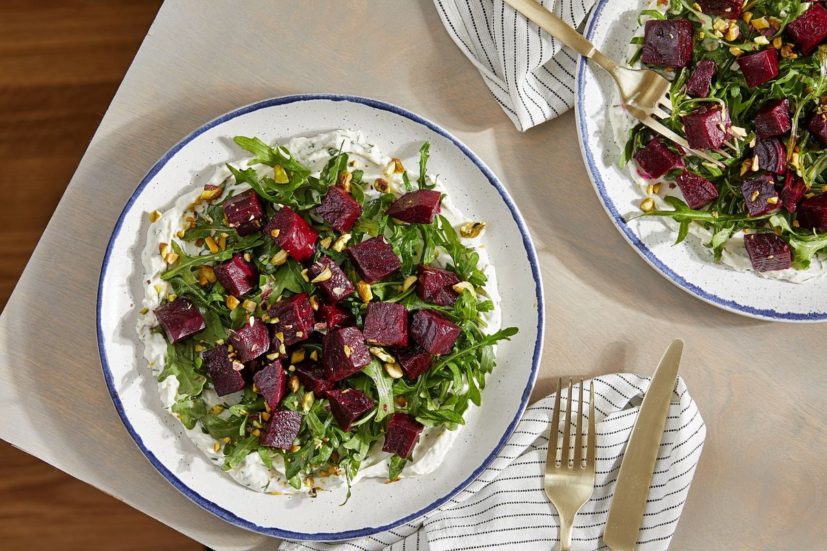 Beet and Arugula Salad With Spiced Yogurt.   (Tom McCorkle for the Washington Post/Food styling by Gina Nistico)