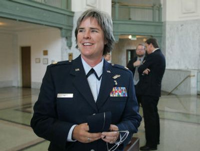 
U.S. Air Force Reserve Maj. Margaret Witt talks with reporters Friday after a hearing in a case in U.S District Court in Tacoma challenging her dismissal from the Air Force for being a lesbian. 
 (Associated Press / The Spokesman-Review)