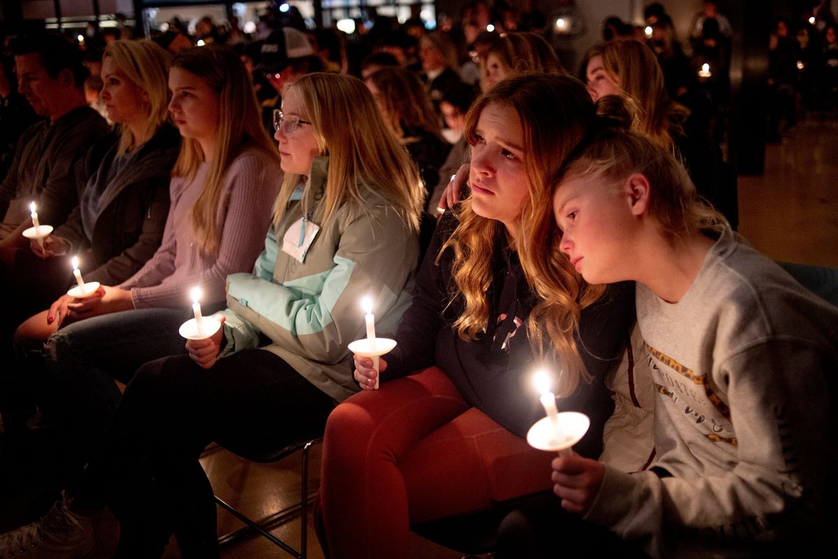 Emerson Miller, right, leans on her friend Joselyn