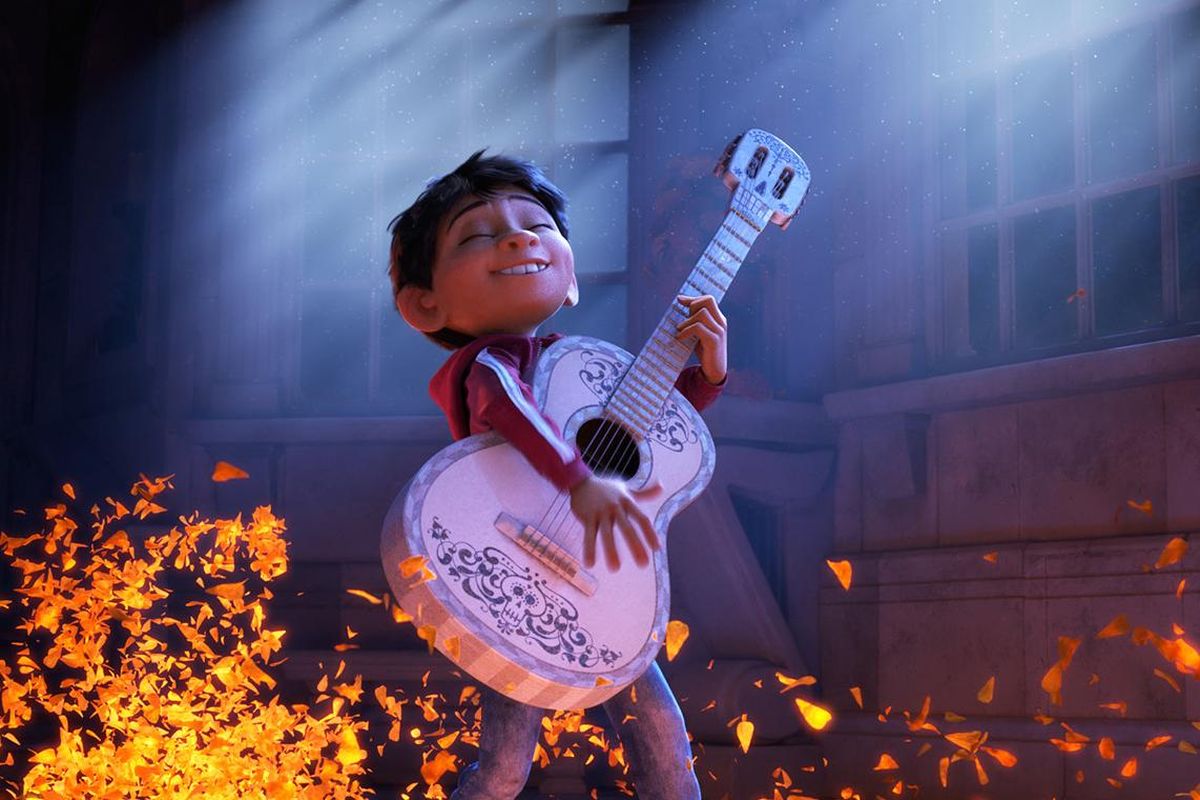 Miguel (voice of newcomer Anthony Gonzalez) dreams of becoming an accomplished musician like the celebrated Ernesto de la Cruz (voice of Benjamin Bratt) in “Coco.” (Pixar)
