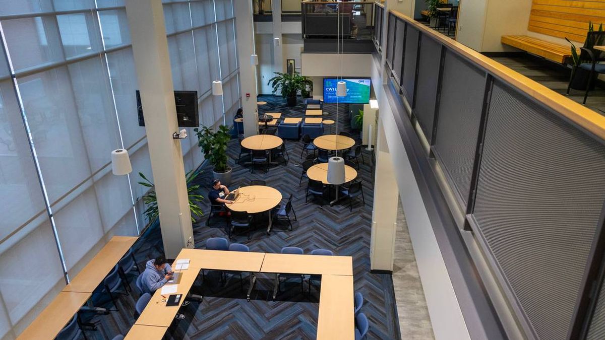 Students sit at tables Thursday inside the Academic Building at College of Western Idaho Nampa Campus.  (Idaho Statesman)