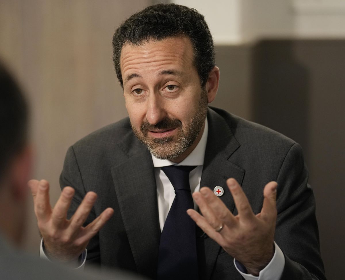 International Committee of the Red Cross Director-General Robert Mardini talks about the humanitarian situation in Ukraine during an interview with The Associated Press, in Dubai, United Arab Emirates, Monday, March 14, 2022. The ongoing Russian war on Ukraine has become "nothing short of a nightmare" for those living in besieged cities, Mardini said Monday, calling for safe passage out for civilians and humanitarian aid to be allowed through the front lines.  (Kamran Jebreili)