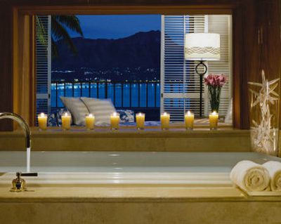 
In this photo provided by Halekulani Hotel, Diamond Head is seen from the bathroom of the Vera Wang Suite at the hotel in the Waikiki section of Honolulu. At $4,000 per night, one of the priciest hotel rooms in Hawaii, the one-bedroom, 2,135-square-foot suite isn't cheap.
 (Associated Press / The Spokesman-Review)