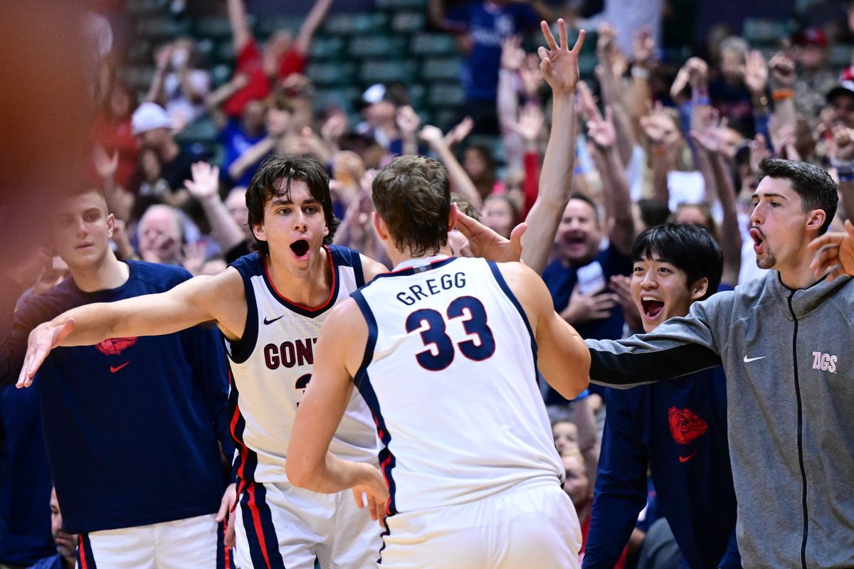 Gonzaga Bulldogs forward Braden Huff (34) cheers after forward Ben Gregg (33) hit a three against the Syracuse Orange during the second half of a college basketball game in the Allstate Maui Invitational on Tuesday, Nov. 21, 2023, at SimpliFi Arena at Stan Sheriff Center in Honolulu, Hawaii. Gonzaga won the game 76-57.  (Tyler Tjomsland/The Spokesman-Review)