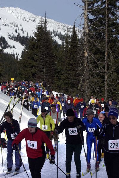 
Skiers get a smooth start at the annual 10K Langlauf ski race at Mount Spokane on Sunday. About 300 people showed up to enjoy snow and sun. 
 (Liz Kishimoto / The Spokesman-Review)