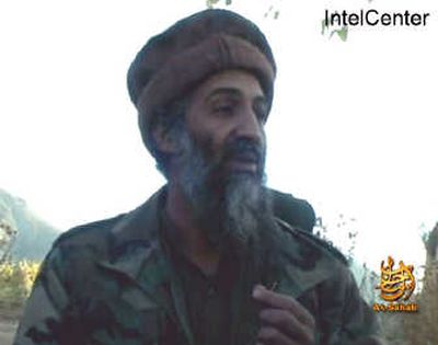 
This image from video made available by IntelCenter on Saturday shows Osama bin Laden in a new videotape posted on a militant Web site by Al-Qaida's media production wing. IntelCenter is a private U.S. company that monitors militant message traffic and provides intelligence services for the American government. Associated Press
 (Associated Press / The Spokesman-Review)