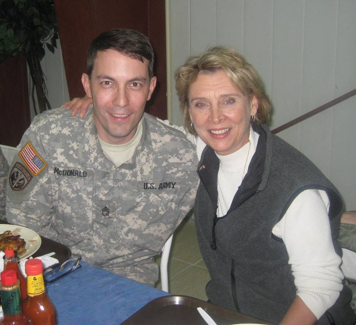 Washington Gov. Chris Gregoire poses with Patrick McDonald, a National Guard reservist from Washington deployed in Iraq. (Courtesy of Patrick McDonald)