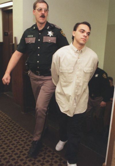 Spokane Sheriff Deputy Dave Reagan escorts 18-year-old Kevin Boot to court in January 1996. Boot appeared before Judge Tari Eitzen on charges stemming from the murder of Felicia Reese. Christopher Anderson photo. (SR)